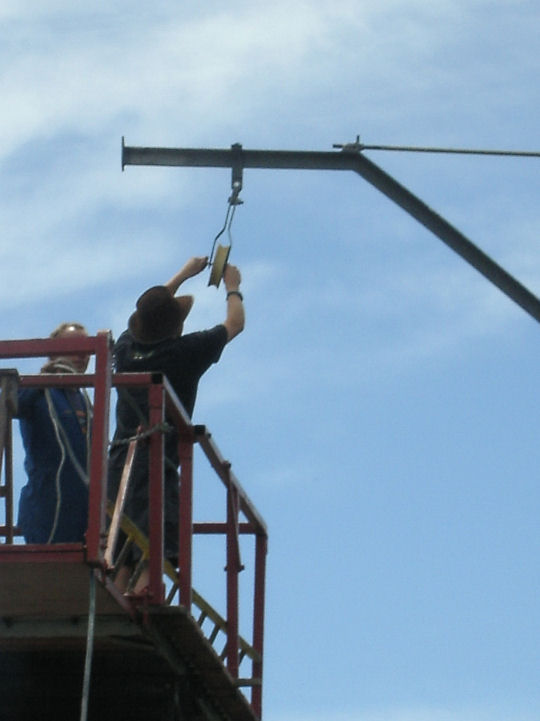 Placing the cable in the pulleys